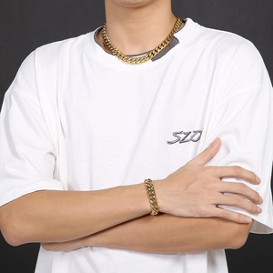 Hip hop gold titanium steel cuban link necklace and bracelet set for men on model