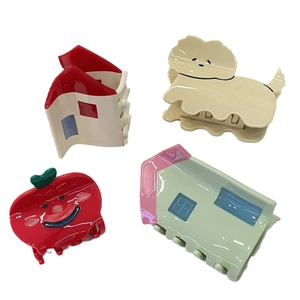 Cute acetate hair claws featuring cartoon dog, house, and apple designs in candy colors