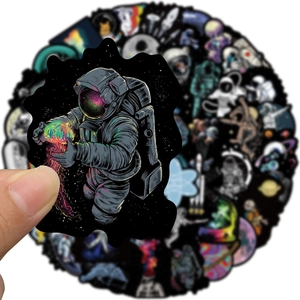 Waterproof astronaut doodle sticker featuring sci-fi cosmic art and colorful nebula