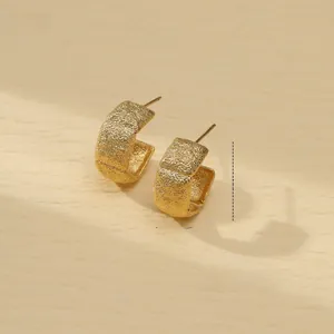 Vintage heart-shaped gold C-hoop earrings in matte textured stainless steel