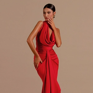 Elegant red backless halter satin evening gown with a slim-fit silhouette and long skirt