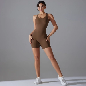 Close-up of brown one-piece yoga romper with seamless high-stretch compression fabric