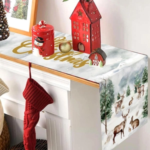 Christmas table runner with deer and snow scene featuring Merry Christmas gold lettering