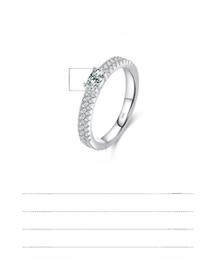 Detail of 925 sterling silver ring with 3x5mm oval stone and double-row zircon band
