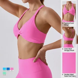 Pink naked-feel yoga set with twist-front sports bra and cross-back straps