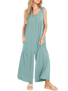 Detail of light teal sleeveless wide leg jumpsuit showing ribbed texture and buttons