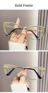 Detail of gold cat-eye metal frame with wide top edge and comfortable black temple tips