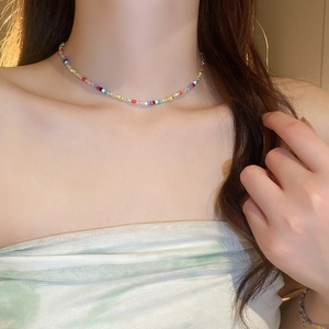 Colorful beaded choker necklace with vibrant tiny beads and silver metal accents for women