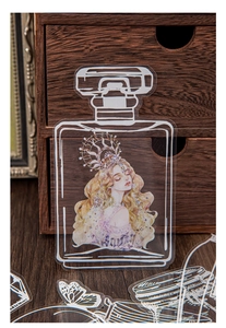 Detailansicht eines Vintage-PET-Aufklebers mit blondem Mädchen in einer Parfümflaschenform