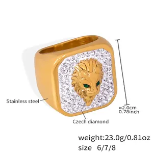 Macro detail of lion head ring in 18K gold plated steel with sparkling white diamonds