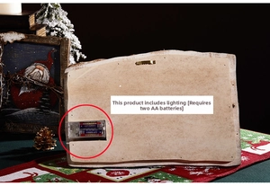 Detail of Christmas wall hanging back showing sawtooth hook and LED light battery box