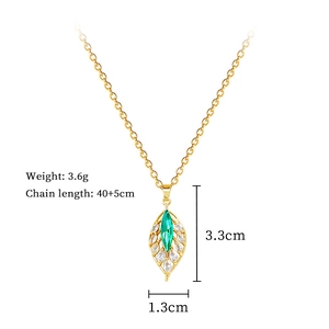 Detailed view of leaf pendant with green gem, 3.6g weight and 40 plus 5cm chain length