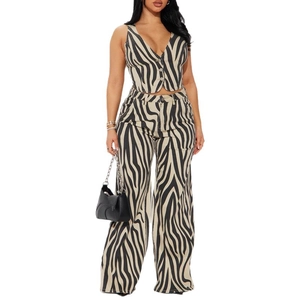 Detail of zebra print two-piece set featuring a V-neck vest and high-waisted wide-leg trousers
