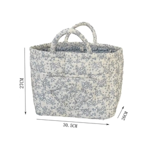 Detail view of corduroy storage basket showing dimensions 30.5cm by 27cm by 26cm