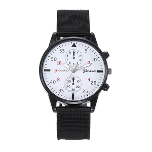 Close-up of Geneva quartz watch featuring a black nylon strap and white dial detail