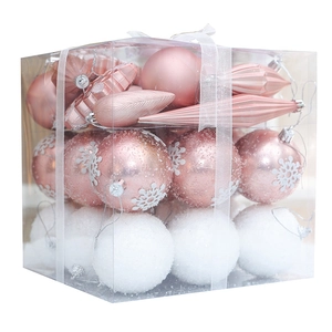 Pink and white Christmas tree ornament set with snowflakes and glitter in a gift box