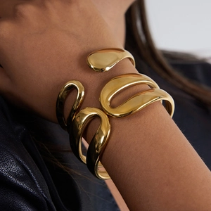 Luxurious gold stainless steel cuff bracelet with high-polish liquid metal texture for women