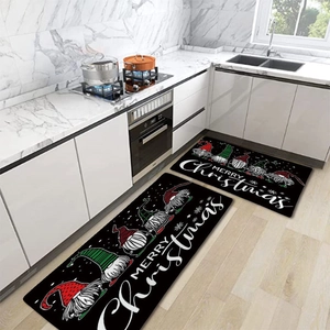 Detail view of two-piece Christmas kitchen rug set with festive gnomes and non-slip backing