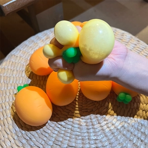 Squeezable carrot stress relief toy made of soft TPR material for sensory play