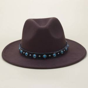 Detail of dark brown wool fedora hat with turquoise stones and silver studs on black band
