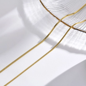Minimalist golden square snake bone chain necklace made of polished stainless steel
