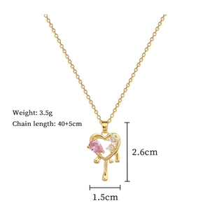 Detailed view of heart pendant with pink crystals and dimensions on white background