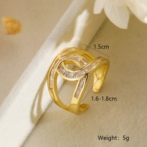 Detail view of gold geometric open ring showing 1.5cm height and zircon stone