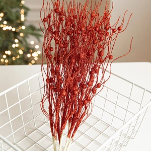 Sparkling red Christmas tree glitter branch with decorative beads for holiday arrangements