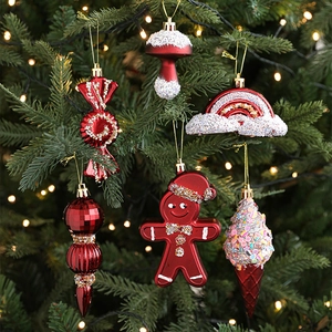 Burgundy Christmas tree ornaments set with mushroom, rainbow and gingerbread man shapes