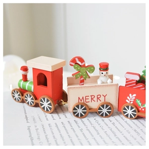 Detailed view of wooden Christmas train with snowman and Merry text on carriages