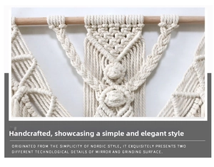 Detailed macro shot of hand-woven macrame wall hanging with white cotton rope geometric patterns