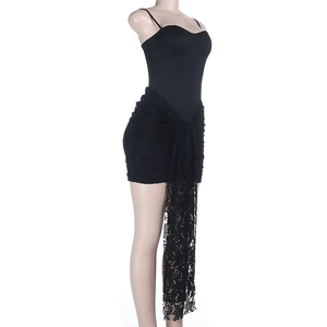 Detail of elegant black bodycon dress featuring intricate lace side tie and slim fit cut