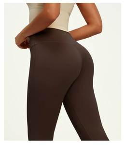 Detail view of high waist yoga flare pants featuring butt-lifting and tummy control seams
