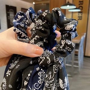 Fashionable paisley print fabric scrunchie in black and navy blue for women hair tie