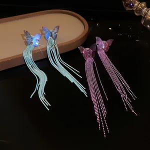 Exquisite butterfly tassel long earrings with blue and purple sparkling resin wings