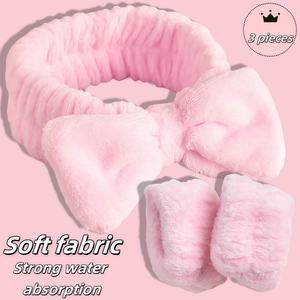 Three-piece pink soft microfiber set featuring a bow headband and matching wristbands