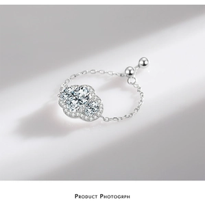 Macro shot of S925 silver cloud ring with sparkling zircon and adjustable chain link
