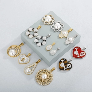 Elegant gold and silver pendant collection featuring faux pearls and sparkling rhinestones