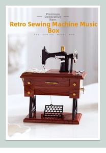 Detailed close-up of retro sewing machine music box with dark wood grain texture and wheels