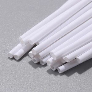 Macro shot of 50 pieces white hollow applicator swabs with soft tips for eyelash cleaning