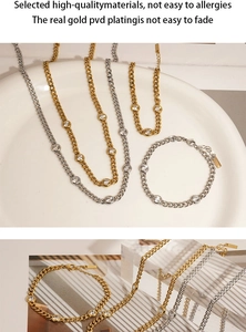 Detail of PVD gold plated Cuban link necklaces and bracelets with inlaid zircon stones