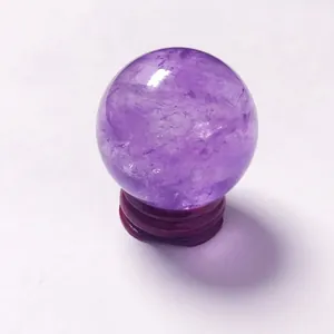 Natural amethyst crystal ball with wooden stand for office and home decor