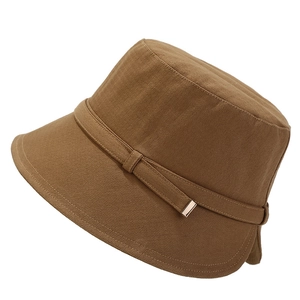 Classic caramel brown cotton bucket hat with adjustable side buckle on white background