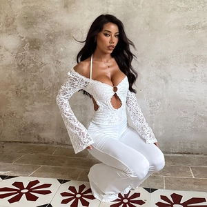 Elegant white lace long sleeve cutout jumpsuit with flared pants for women outfit