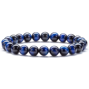 Macro shot of blue tiger eye stone beads on a stretch bracelet with glossy texture