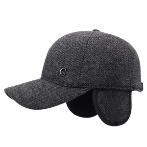 Winter wool newsboy cap for men with ear flaps and warm thick lining in dark grey tweed