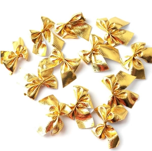 Set of 12 metallic gold Christmas bow ornaments with fine mesh texture for DIY decor