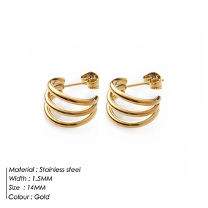 Detail shot of golden 14mm stainless steel triple layered C-shaped hoop earrings