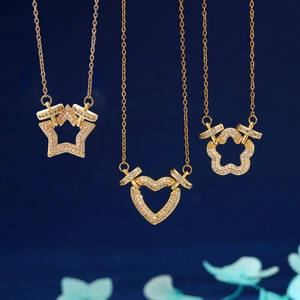 Elegant 18K gold plated copper necklace set with star, heart and flower zircon pendants