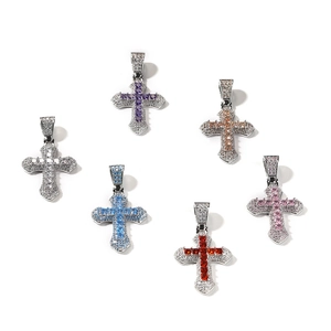 Hip hop silver cross necklaces set with multi-colored cubic zirconia in flat lay view